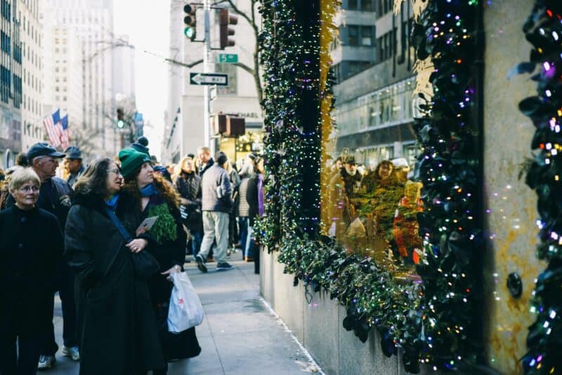 Window shoppers on Fifth Avenue during winter in New York City